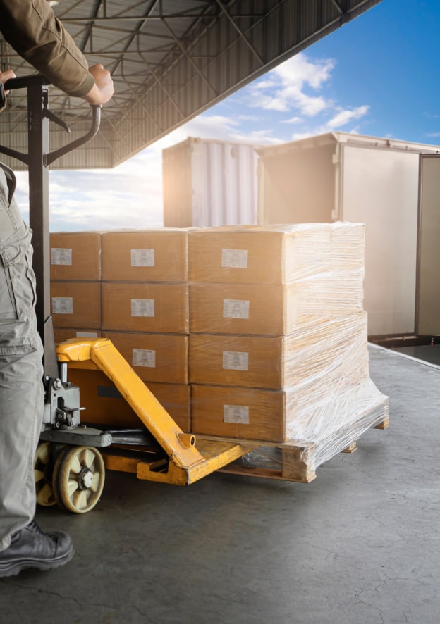 warehouse-worker-unloading-package-boxes-into-1940125915 1-min